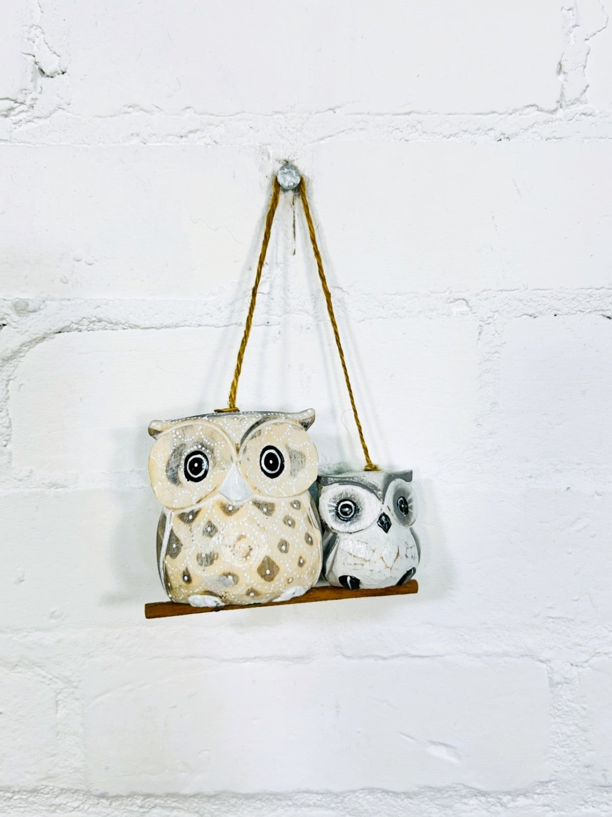 Hanging Owls On Perch
