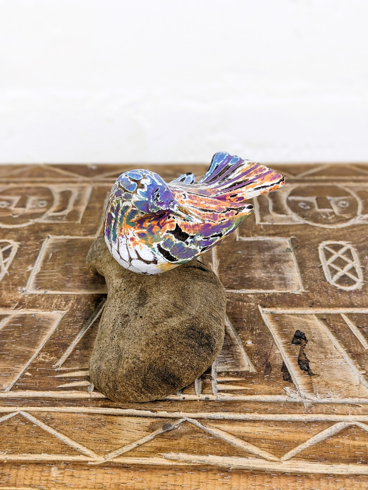 Multicolour Bird On Driftwood