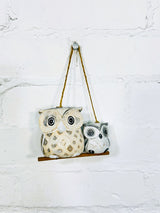 Hanging Owls On Perch