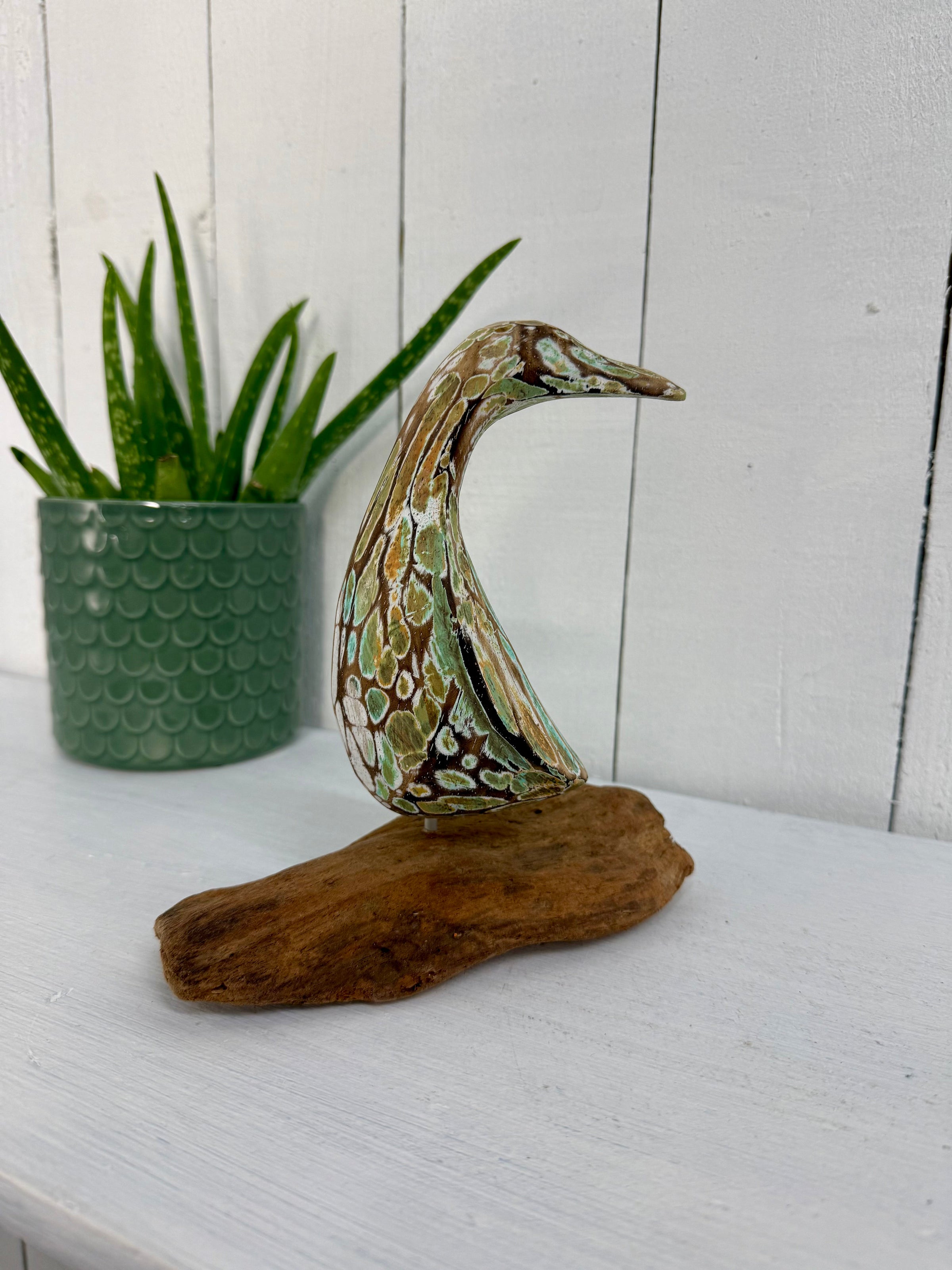 Green Duck on Driftwood
