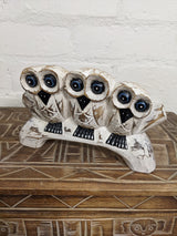 Three White Owls On Bench