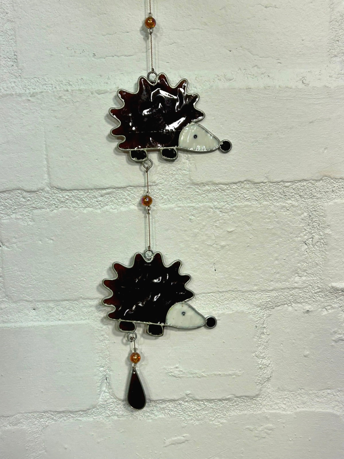Five Hedgehogs Suncatcher