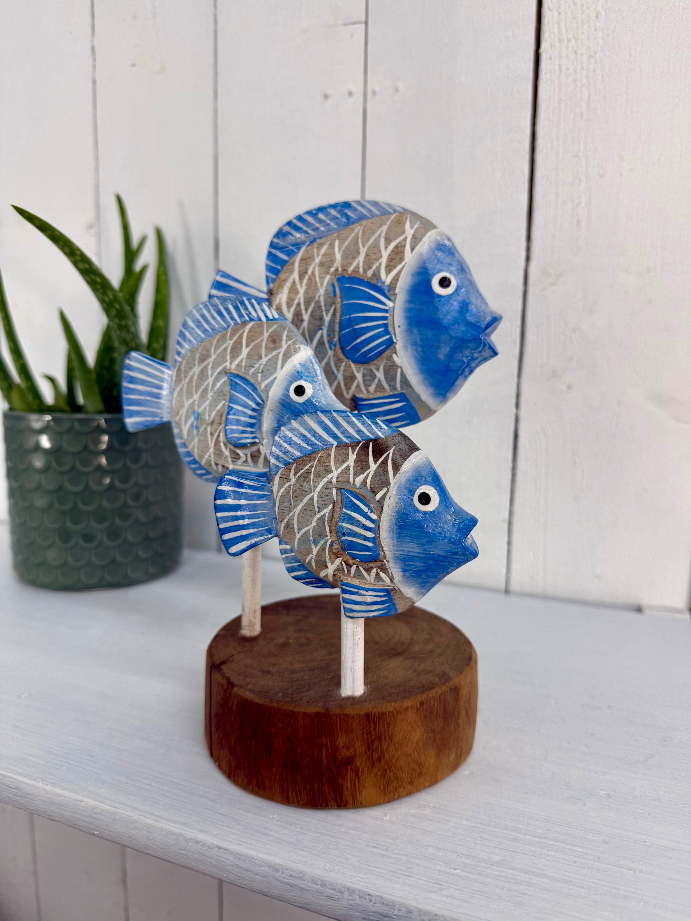Three Fish on Round Stand