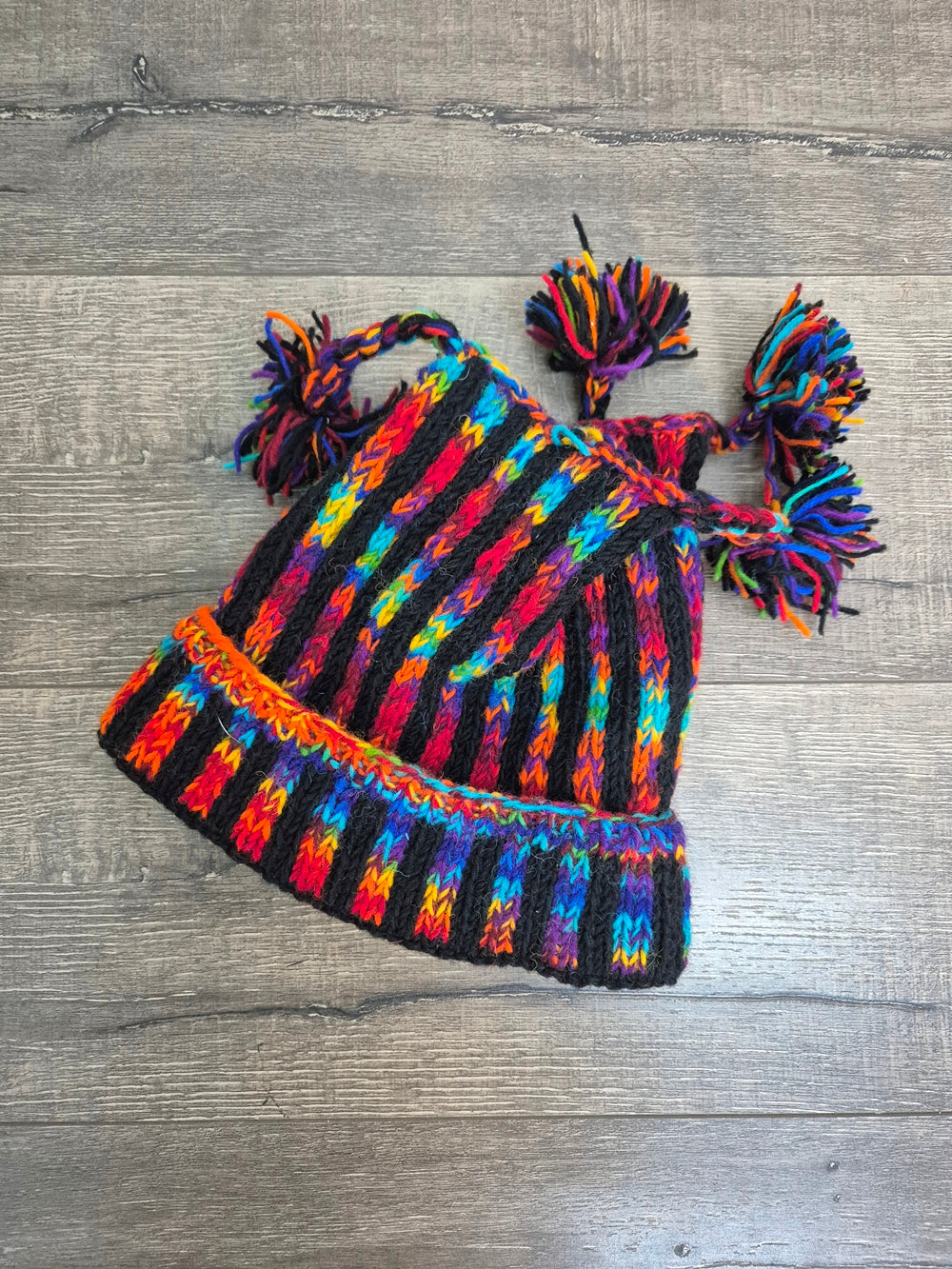 Knitted Hat With Four Tassels