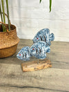 Three Fish On A Stand