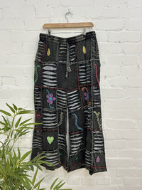 Slash and Flower Wide Leg Trousers