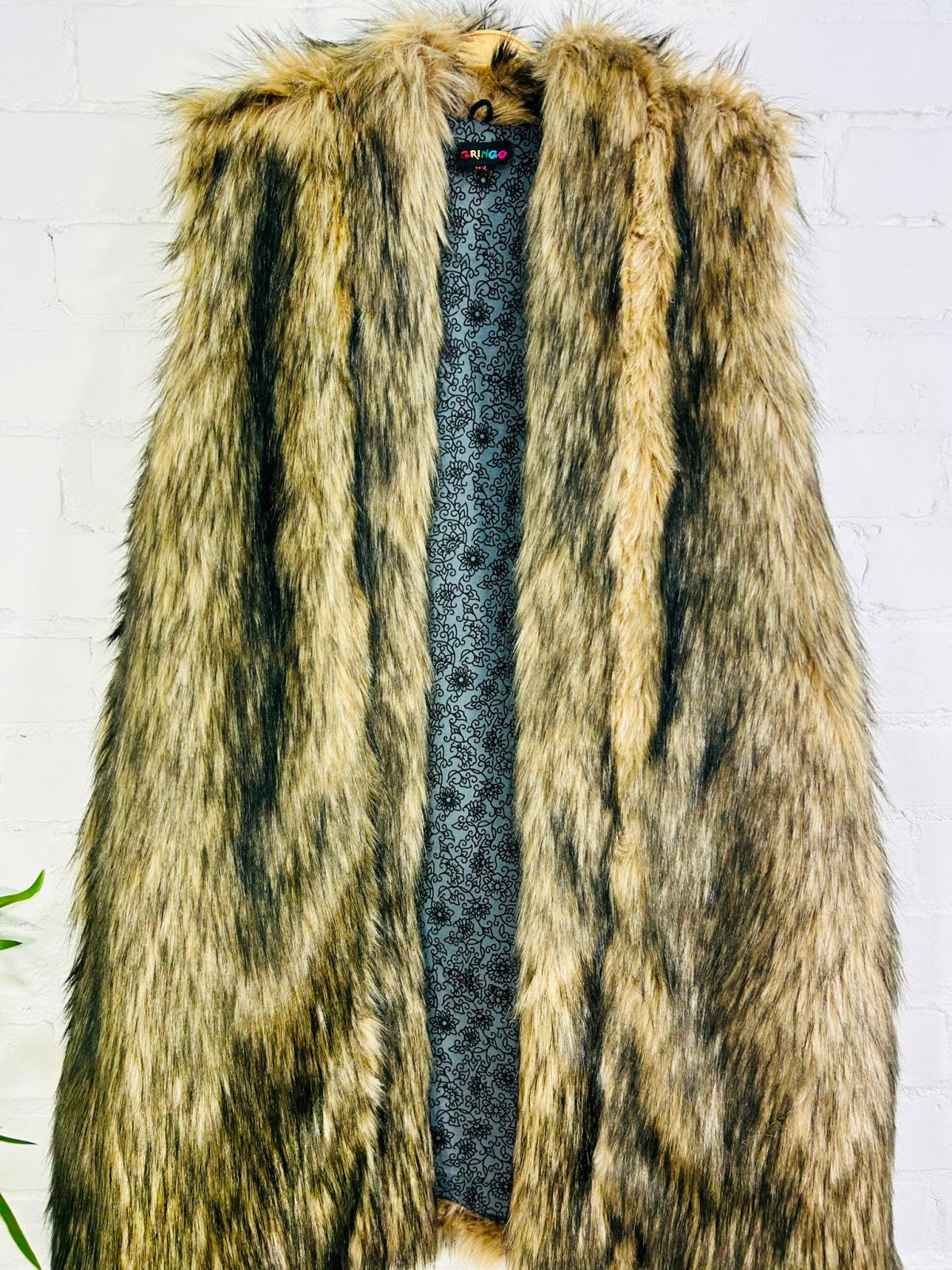 Long Sleeveless Faux Fur Coat