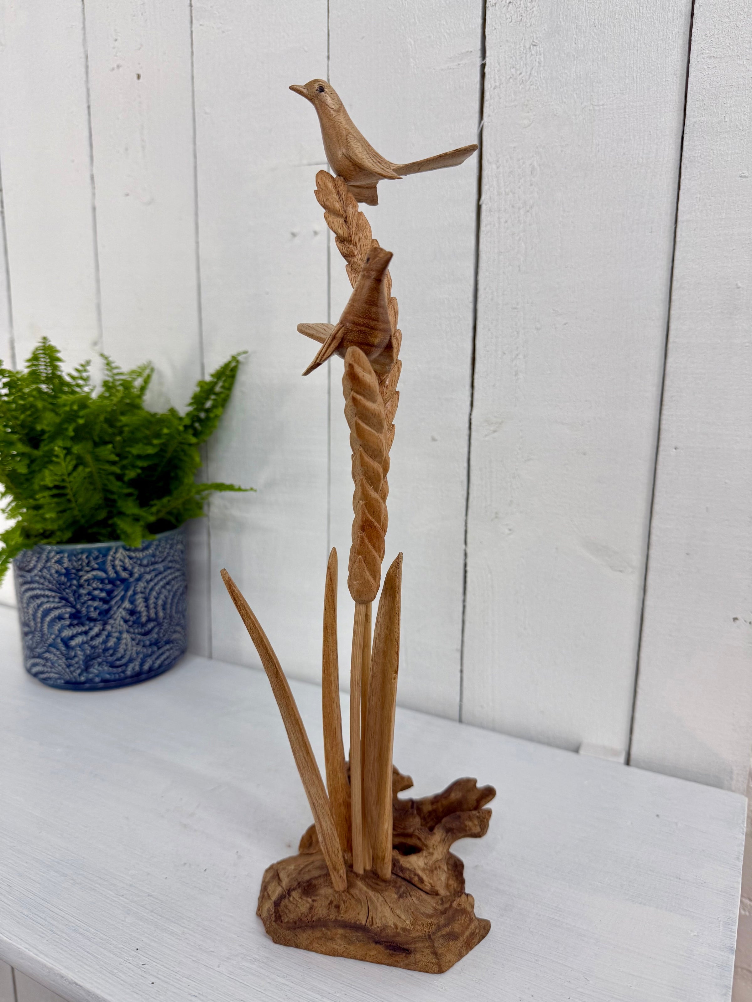 Wooden Birds on Wheat