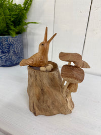 Wooden Bird in Nest with Mushrooms