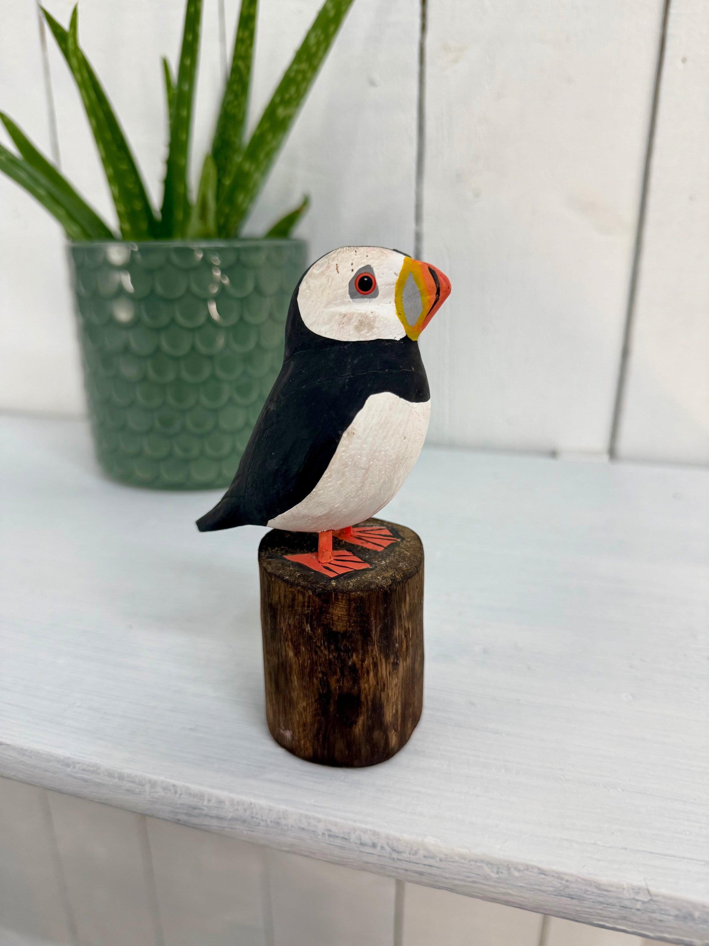 Wooden Puffin on Log