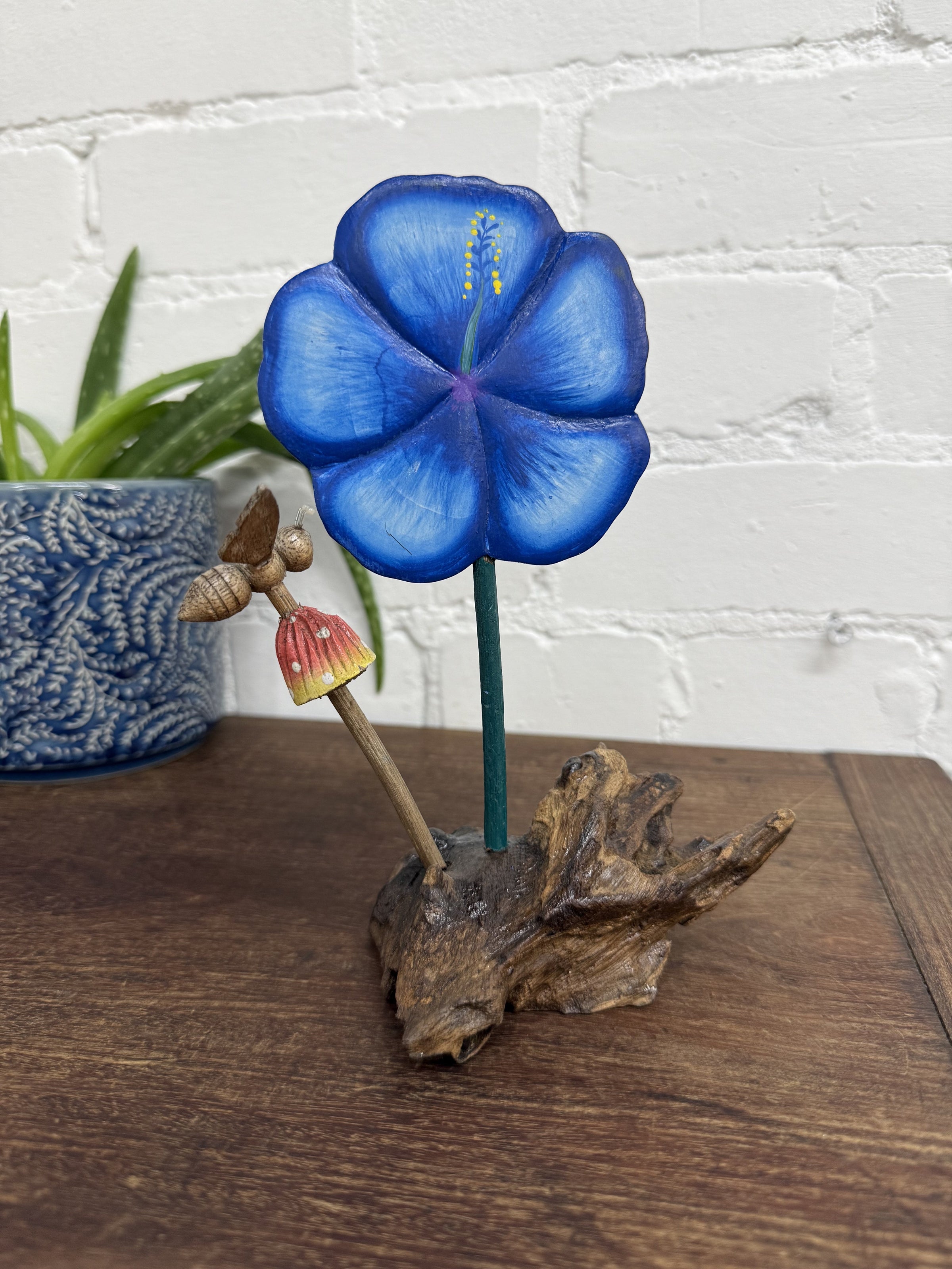 Blue Painted Flower On Log With Mushroom & Bee