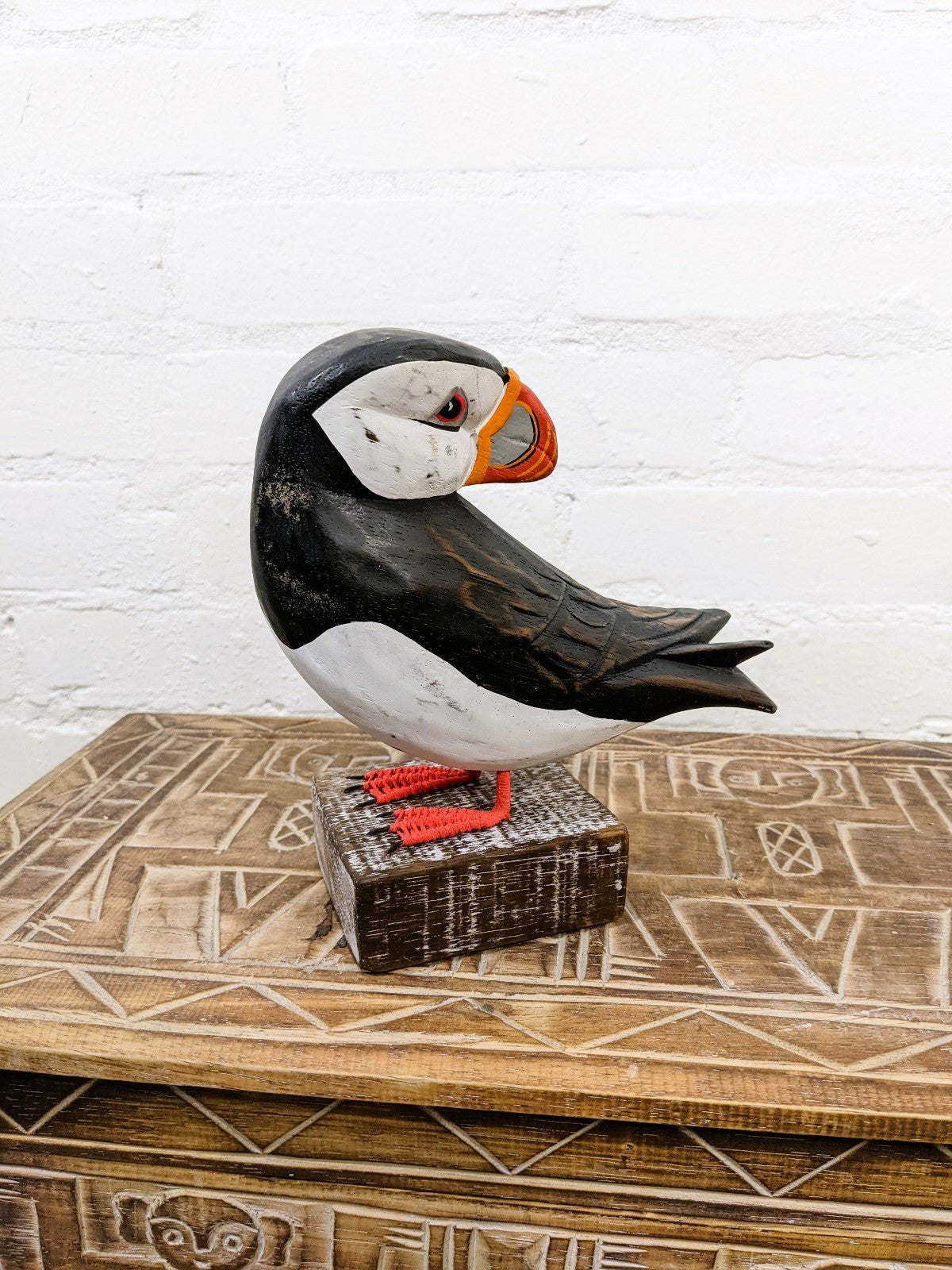 Puffin on Wood Block Turning Back