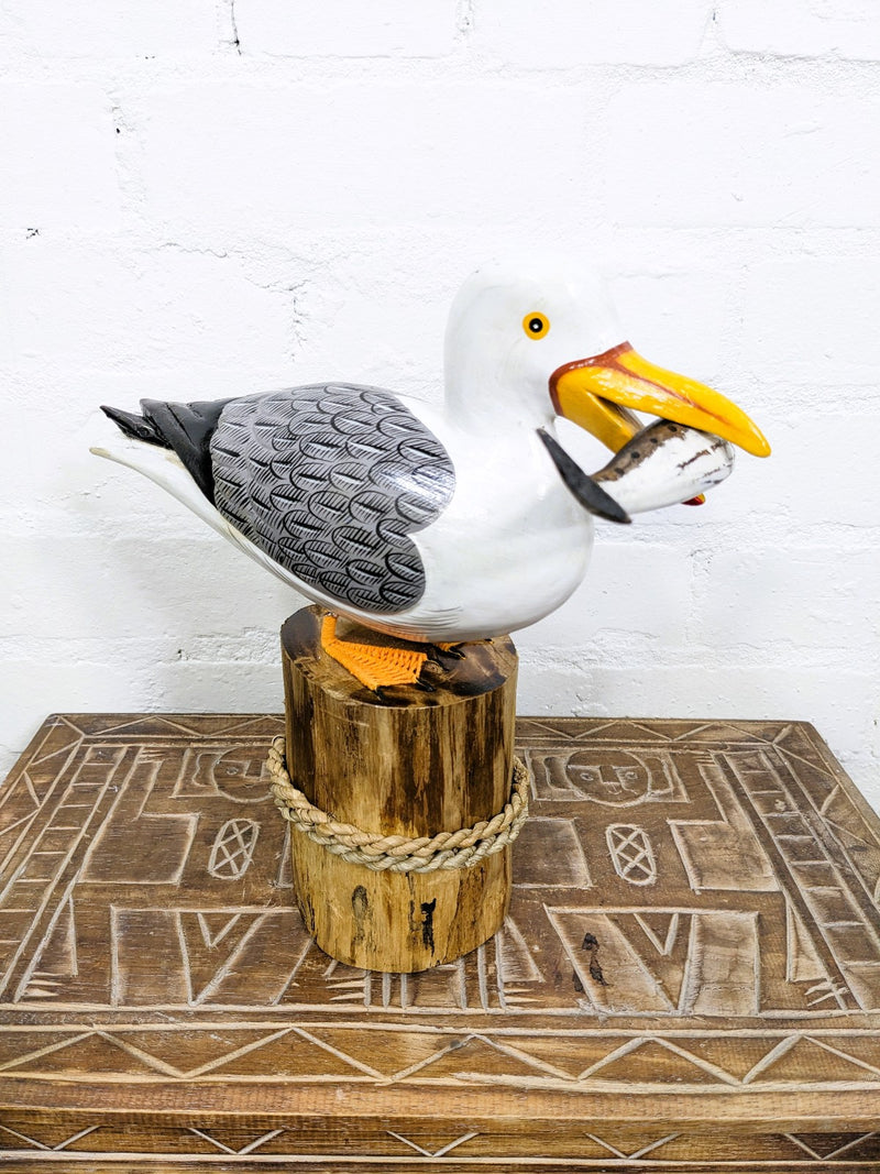Seagull With Fish On Log