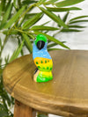 Tiny Perched Parrot