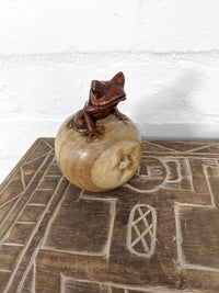 Frog Sitting On Apple